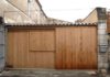 You think it’s just a regular garage, but wait until you see the inside!