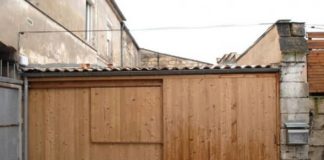 You think it’s just a regular garage, but wait until you see the inside!