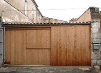 You think it’s just a regular garage, but wait until you see the inside!