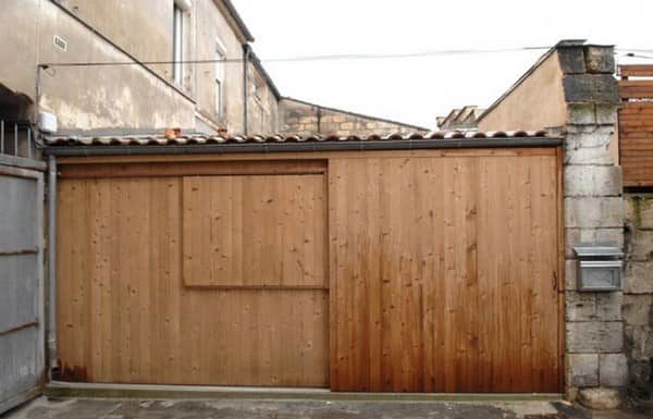 You think it’s just a regular garage, but wait until you see the inside!